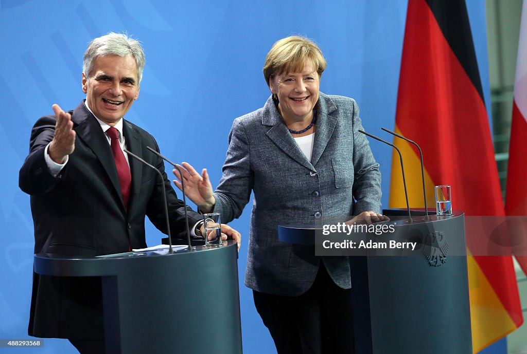 Merkel And Feymann Discuss Migrants Crisis