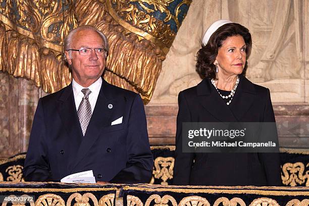 King Carl XVI Gustaf and Queen Silvia of Sweden attend a service at the Church of St. Nicholas in connection with the opening of the parliamentary...