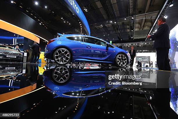 Opel Astra automobile, produced by Adam Opel AG, sits on display during previews for the IAA Frankfurt Motor Show in Frankfurt, Germany, on Tuesday,...