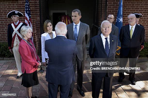 Spanish King Felipe VI and Queen Letizia speaks with officials after placing a wreath at the tomb of the first President of the US George Washington...