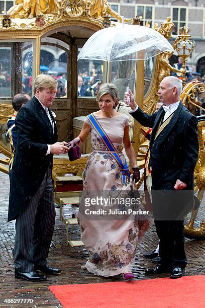 King Willem-Alexander , and Queen Maxima of The Netherlands arrive in The Golden Carriage for Prinsjesdag at The Binnenhof on September 15, 2015 in...