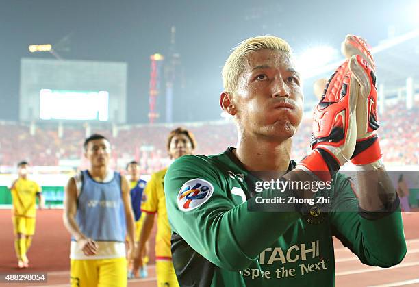 Sugeno Takanori of Kashiwa Reysol reacts after losing the Asian Champions League Quarter Final match between Guangzhou Evergrande and Kashiwa Reysol...