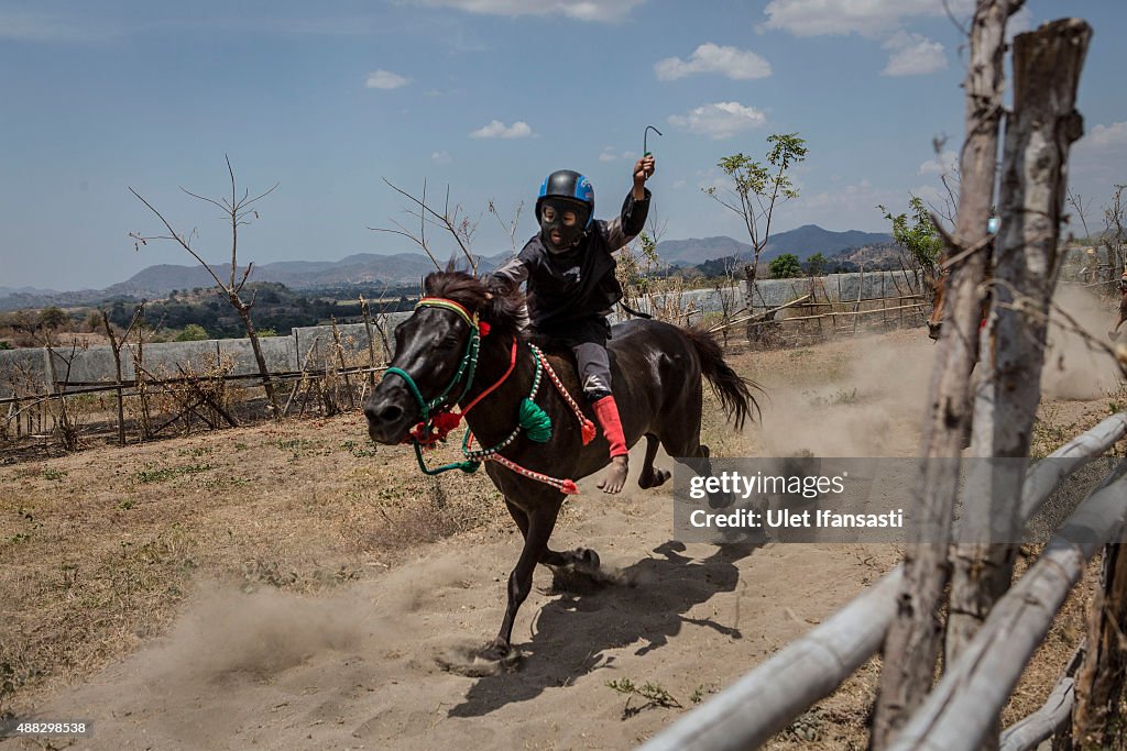 Child Jockeys Compete In Traditional Indonesian Horse Race