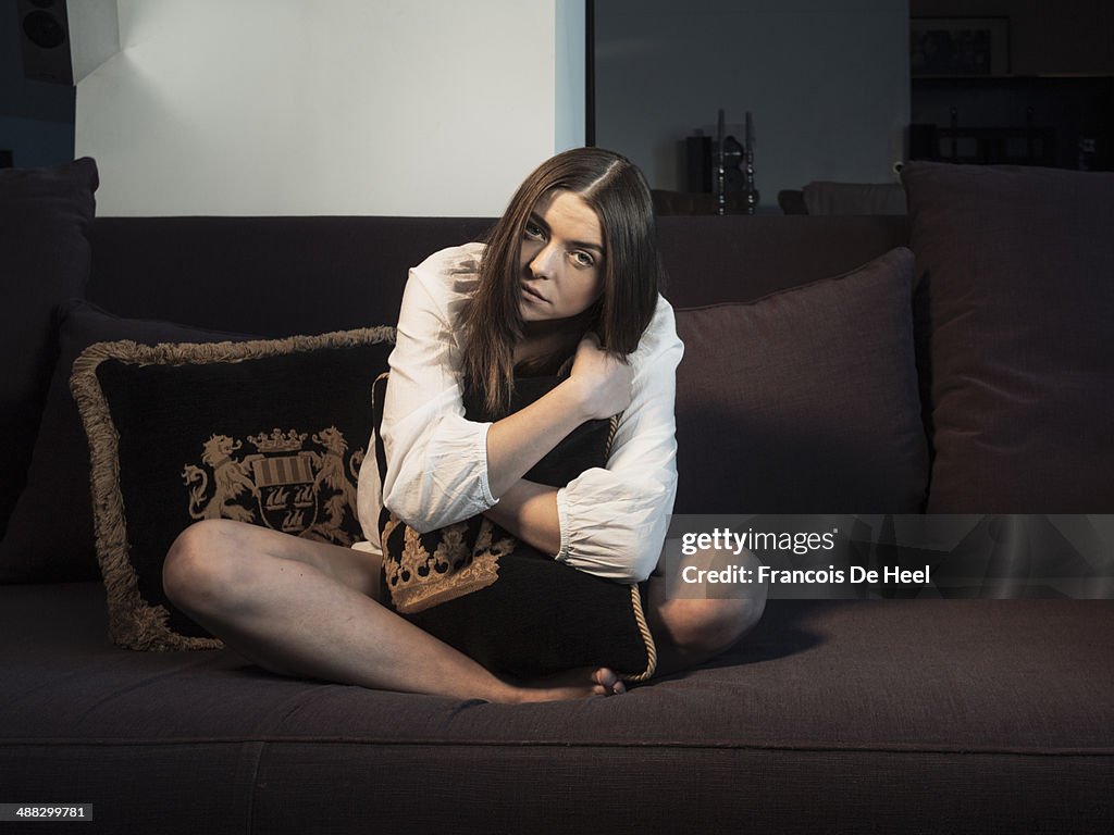 Young woman at her fancy apartment in Brussels