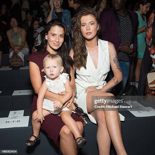 Hilaria Baldwin, Carmen Gabriela Baldwin and Ireland Baldwin attend the Badgley Mischka fashion show during Spring 2016 New York Fashion Week at The...