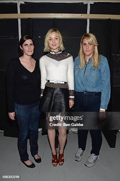 Laura Mulleavy, Bella Heathcote, and Kate Mulleavy pose backstage at Rodarte Spring 2016 during New York Fashion Week at Center 548 on September 15,...