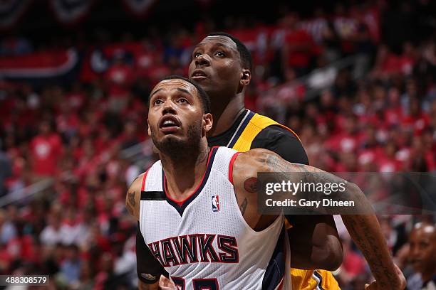 Mike Scott of the Atlanta Hawks boxes out Ian Mahinmi of the Indiana Pacers during Game Six of the Eastern Conference Quarterfinals on May 1, 2014 at...