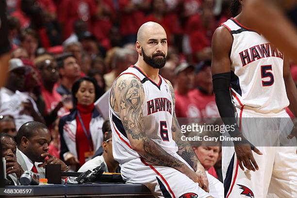 Pero Antic of the Atlanta Hawks waits to get in the game against the Indiana Pacers during Game Six of the Eastern Conference Quarterfinals on May 1,...