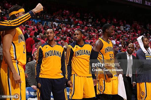 Evan Turner of the Indiana Pacers celebrates on the bench against the Atlanta Hawks during Game Six of the Eastern Conference Quarterfinals on May 1,...