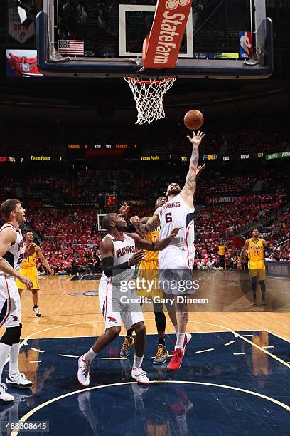 Pero Antic of the Atlanta Hawks grabs a rebound against the Indiana Pacers during Game Six of the Eastern Conference Quarterfinals on May 1, 2014 at...