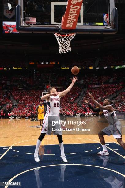 Kyle Korver of the Atlanta Hawks grabs a rebound against the Indiana Pacers during Game Six of the Eastern Conference Quarterfinals on May 1, 2014 at...