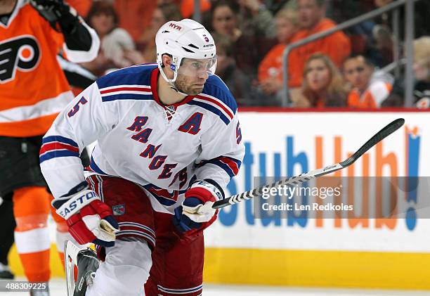 Dan Girardi of the New York Rangers skates against the Philadelphia Flyers in Game Six of the First Round of the 2014 Stanley Cup Playoffs at the...