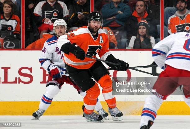 Scott Hartnell of the Philadelphia Flyers skates against Mats Zuccarello of the New York Rangers in Game Six of the First Round of the 2014 Stanley...