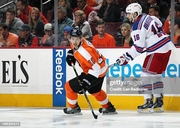 Brayden Schenn of the Philadelphia Flyers in action against Derek Brassard of the New York Rangers in Game Six of the First Round of the 2014 Stanley...