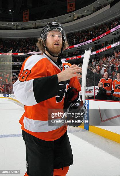 Claude Giroux of the Philadelphia Flyers celebrates after defeating the New York Rangers 5-2 in Game Six of the First Round of the 2014 Stanley Cup...