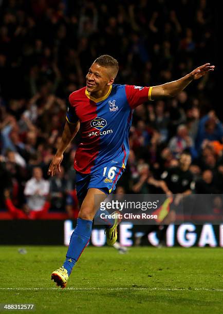 Dwight Gayle of Crystal Palace celebrates after scoring his team's third goal to level the scores at 3-3 during the Barclays Premier League match...