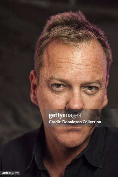 Actor Kiefer Sutherland poses for a portrait session on March 20, 2012 in Los Angeles, California.