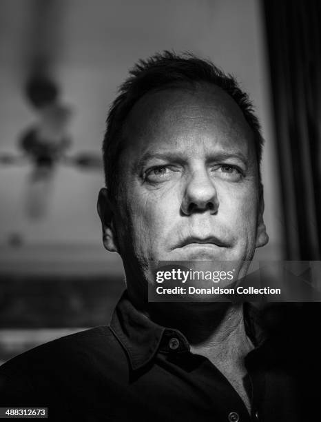 Actor Kiefer Sutherland poses for a portrait session on March 20, 2012 in Los Angeles, California.