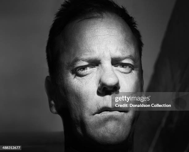 Actor Kiefer Sutherland poses for a portrait session on March 20, 2012 in Los Angeles, California.