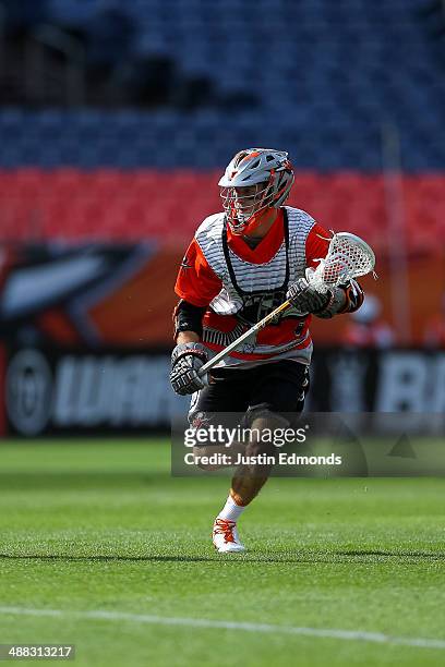 Drew Snider of the Denver Outlaws in action against the Ohio Machine at Sports Authority Field at Mile High on May 4, 2014 in Denver, Colorado. The...