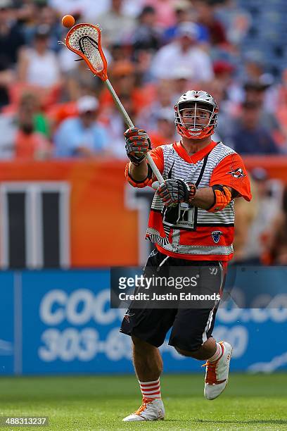 Justin Pennington of the Denver Outlaws in action against the Ohio Machine at Sports Authority Field at Mile High on May 4, 2014 in Denver, Colorado....