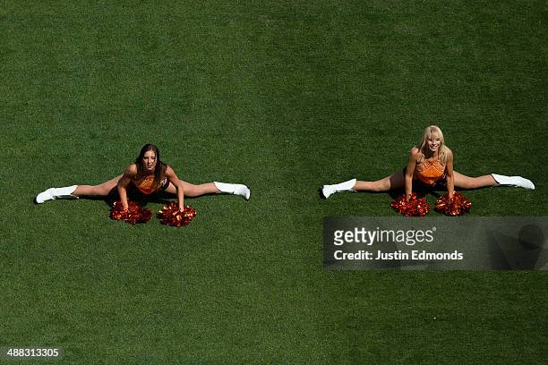 The Denver Outlaws cheerleaders perform during a break in the action against the Ohio Machine at Sports Authority Field at Mile High on May 4, 2014...