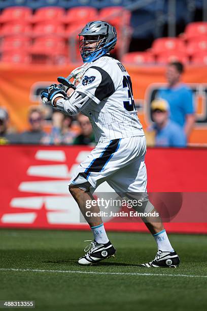 Erik Krum of the Ohio Machine in action against the Denver Outlaws at Sports Authority Field at Mile High on May 4, 2014 in Denver, Colorado. The...