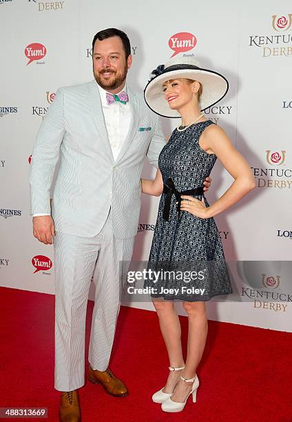 Actors Michael Gladis and Beth Behrs attends the 140th Kentucky Derby at Churchill Downs on May 3, 2014 in Louisville, Kentucky.