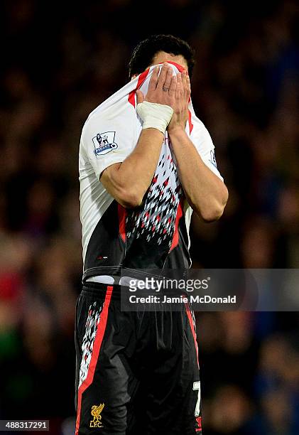 Dejected Luis Suarez of Liverpool reacts following his team's 3-3 draw during the Barclays Premier League match between Crystal Palace and Liverpool...