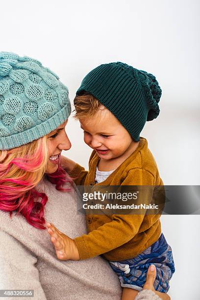 mother and son - fashionable mom stock pictures, royalty-free photos & images