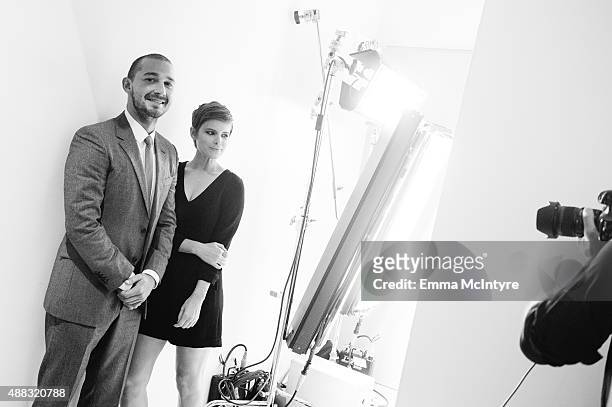 Actors Shia LaBoeuf and Kate Mara of 'Man Down' pose for a portrait in the Guess Portrait Studio on September 15, 2015 in Toronto, Canada.