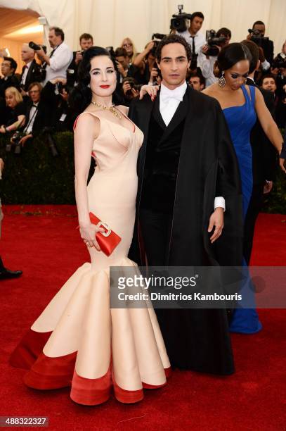 Dita Von Teese and designer Zac Posen attend the "Charles James: Beyond Fashion" Costume Institute Gala at the Metropolitan Museum of Art on May 5,...