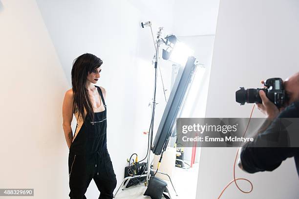 Valerie Anne Poxleitner aka 'Lights' poses for a portrait with Maarten de Boer in the Guess Portrait Studio at the Toronto International Film...