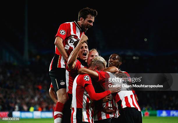 Eindhoven players celebrate the goal scored by Hector Moreno of PSV Eindhoven during the UEFA Champions League Group B match between PSV Eindhoven...