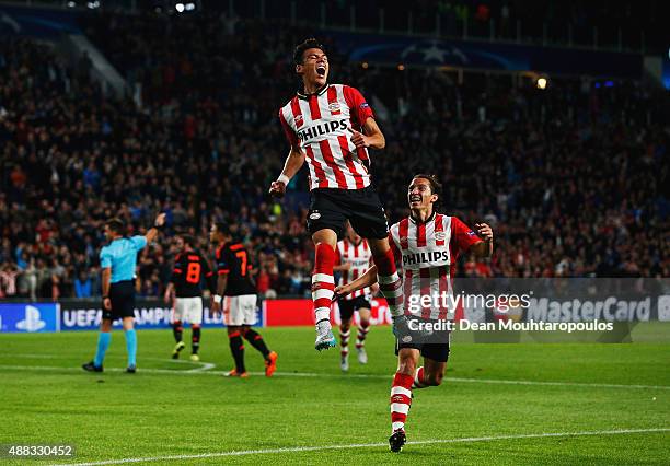 Hector Moreno of PSV Eindhoven celebrates as he scores their first and equalising goal during the UEFA Champions League Group B match between PSV...