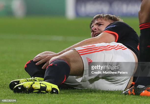 Luke Shaw of Manchester United lies injured during the UEFA Champions League match between PSV Eindhoven and Manchester United at Philips Stadion on...