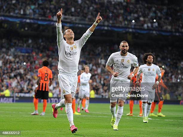 Cristiano Ronaldo of Real Madrid celebrates after scoring Real's 2nd goal from the penalty spot during the UEFA Champions League Group A match...