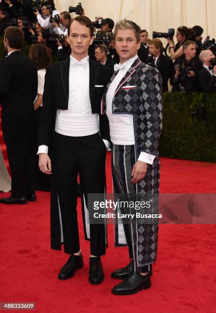 Actor Neil Patrick Harris and David Burtka attend the "Charles James: Beyond Fashion" Costume Institute Gala at the Metropolitan Museum of Art on May...