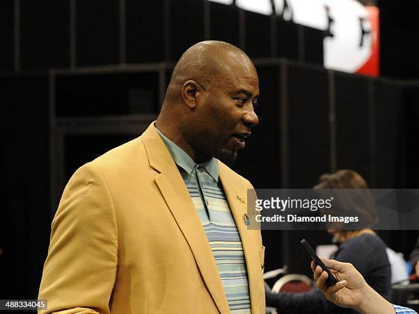 Hall of fame linebacker Chris Doleman answers questions from the media during the first Pro Football Hall of Fame Fan Fest at the IX Center in...