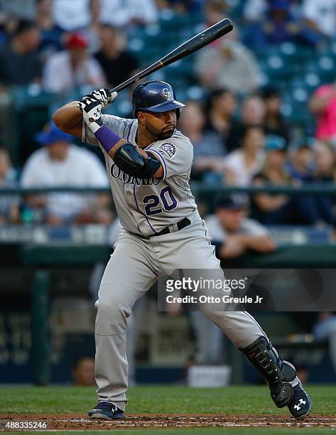 Wilin Rosario of the Colorado Rockies bats against the Seattle Mariners at Safeco Field on September 12, 2015 in Seattle, Washington.