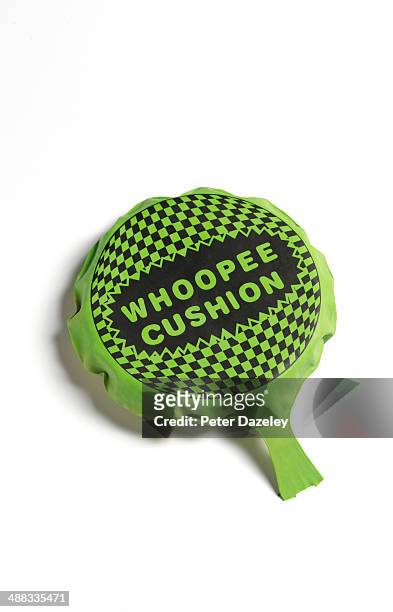 whoopee cushion - farting stock pictures, royalty-free photos & images