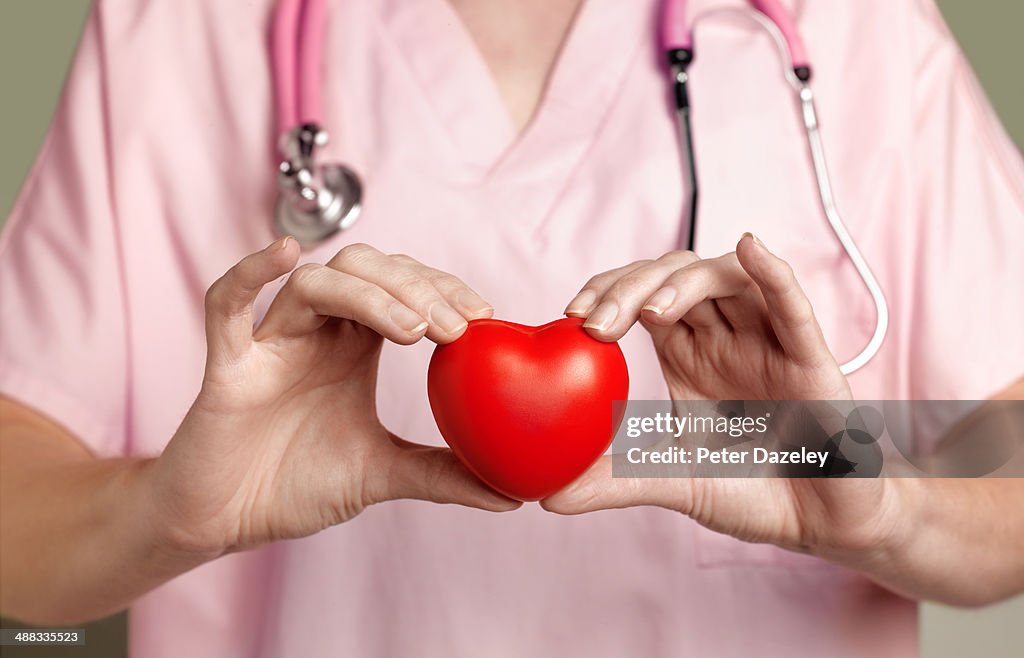 Cardiologist with heart