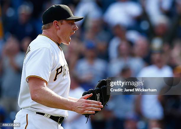 Mark Melancon of the Pittsburgh Pirates reacts after closing out the 9th inning against the Chicago Cubs during game one of the doubleheader at PNC...