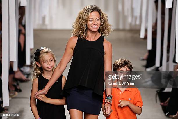 Designer Michelle Smith walks the runway at the Milly By Michelle Smith show during Spring 2016 New York Fashion Week at Art Beam on September 15,...