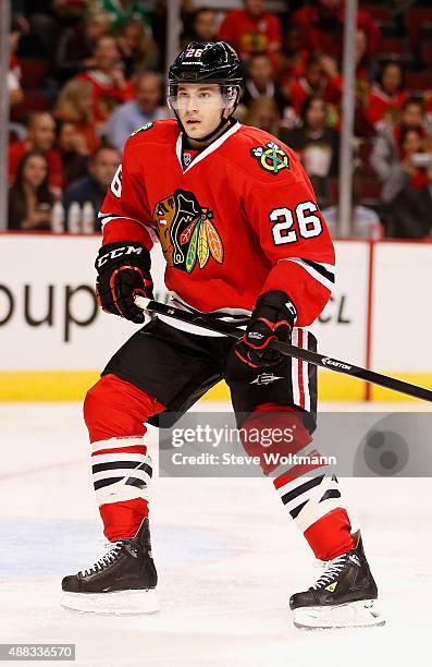 Kyle Cumiskey of the Chicago Blackhawks plays in the preseason game against the Montreal Canadiens at the United Center on October 1, 2014 in...