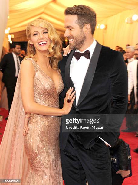 Blake Lively and Ryan Reynolds attend the "Charles James: Beyond Fashion" Costume Institute Gala at the Metropolitan Museum of Art on May 5, 2014 in...