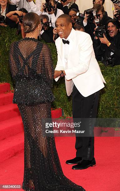Jay-Z and Beyonce attends the "Charles James: Beyond Fashion" Costume Institute Gala at the Metropolitan Museum of Art on May 5, 2014 in New York...