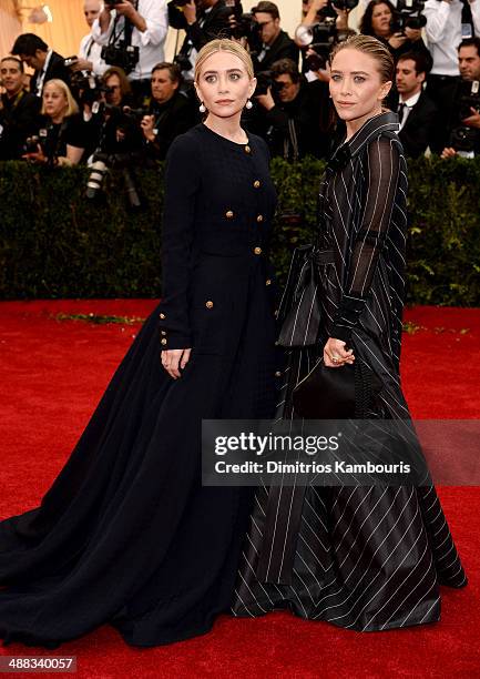 Ashely Olsen and Mary-Kate Olsen attend the "Charles James: Beyond Fashion" Costume Institute Gala at the Metropolitan Museum of Art on May 5, 2014...