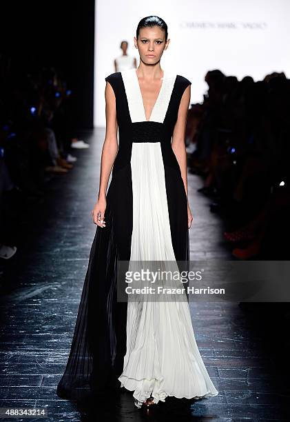 Model Alisar Ailabouni walks the runway wearing Carmen Marc Valvo Women's and Men's Collection S/S 2016 during New York Fashion Week: The Shows at...