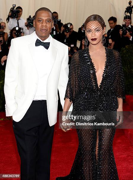 Jay-Z and Beyonce attend the "Charles James: Beyond Fashion" Costume Institute Gala at the Metropolitan Museum of Art on May 5, 2014 in New York City.